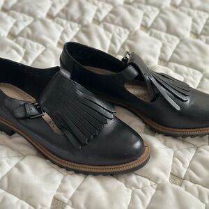 Clark’s black Leather Women's Loafers with Fringe Detail